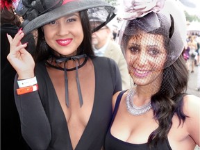 DAZZLE IN THE DRIZZLE: Keilani Elizabeth Rose and Renata Rizk didn't let a little morning shower deter them from meeting the go-for-it dress code at Hastings Park Racecourse's annual Deighton Cup event.