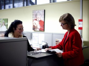 Executive Coordinator Yvette Marquis, (left), and Seniors Advocate Isobel Mackenzie discuss details in a report in their office in Victoria, B.C., on Friday, December 15, 2017. Skyrocketing rents and dwindling affordable-housing units in Vancouver are driving seniors to the brink of homelessness, forcing some to couch surf, seek roommates or even live in cars, advocates say.