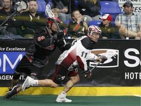 The Vancouver Stealth's Peter McFetridge tries to track down Colorado's Taylor Stuart during an NLL playoff game against the Mammoth at the Langley Events Centre last spring.