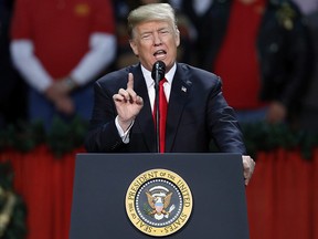 U.S. President Donald Trump regaled a rally of supporters Friday night with a story about a disagreement with Canada's prime minister, and sprinkled his tale with some questionable statistics about international trade. President Trump speaks during a rally in Pensacola, Fla., Friday, Dec. 8, 2017.