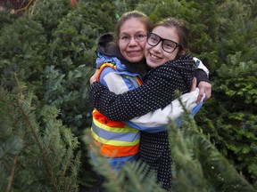 Marcia Tait and her daughter Makani Tait are volunteering at Aunt Leah's Christmas Tree lot in New Westminster.