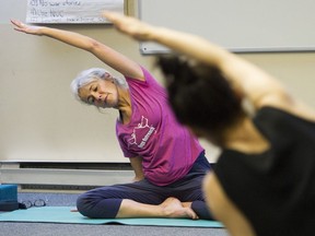 Yoga Outreach instructor  Brenda teaches a class at the Pacifica Treatment Centre in Vancouver.