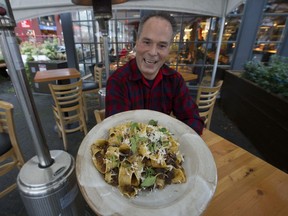 You've got one week to get your taste buds ready for Dine Out Vancouver. The list of participating restaurants is being released Thursday. Eric Pateman, president and chef at Edible Canada, shows off a dish of Newfoundland seal pappardelle on Vancouver's Granville Island in this January 2017 photo. His restaurant is among those participating this year.