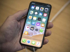 Apple is cutting production of the iPhone X by half, reports Nikkei.