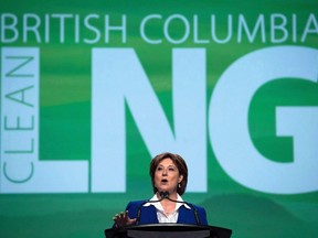 FILE PHOTO - British Columbia Premier Christy Clark addresses the LNG in BC Conference in Vancouver on October 14, 2015. Premier Christy Clark's dreams of a booming liquefied natural gas industry in British Columbia were dealt another blow yesterday when a Shell-backed venture delayed a final decision indefinitely on a project in Kitimat.