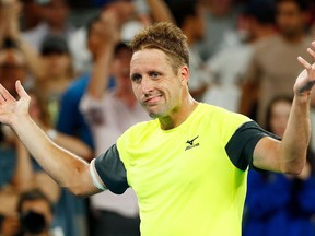 Tennys Sandgren shrugs after beating Dominic Thiem at the Australian Open on Jan. 22.