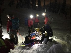 North Shore Rescue volunteers worked well into the evening Tuesday to get a skier injured in an avalanche off Mount Seymour.