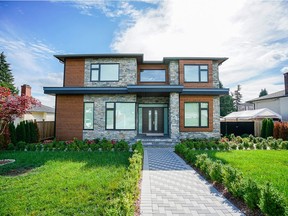 This home at 6460 Aubrey Street in Burnaby sold for $2,650,000. For Sold (Bought) in Westcoast Homes. [PNG Merlin Archive]