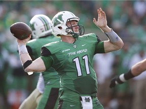 Michael Birdsong of the Marshall Thundering Herd passes in the second half against the Purdue Boilermakers at Joan C. Edwards Stadium on Sept. 6, 2015, in Huntington, West Virginia. Birdsong has signed a contract with the B.C. Lions of the CFL.
