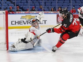 Brett Howden of Canada scores past Philip Wüthrich of Switzerland for Canada's first goal in their world junior quarter-final at the KeyBank Center on Jan. 2, 2018 in Buffalo. Howden added two second-period assists in Canada's 8-2 victory.