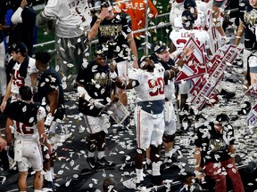 Jamar King of the Alabama Crimson Tide celebrates beating the Georgia Bulldogs in overtime to win the CFP National Championship presented by AT&T at Mercedes-Benz Stadium on Jan. 8, 2018 in Atlanta, Ga. Alabama won 26-23.