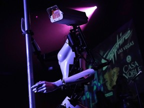 LAS VEGAS, NV - JANUARY 08:  A 'stripper robot' performs during a debut of the first robotic exotic dancers in the world at Sapphire Las Vegas Gentlemen's Club on the eve of the CES 2018 January 8, 2018 in Las Vegas, Nevada. The Sapphire will host the robotic dancers from January 9th to the 13th to mark the annual consumer technology trade show.