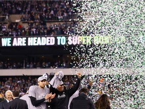 Head coach Doug Pederson and Nick Foles #9 of the Philadelphia Eagles celebrate their teams win over the Minnesota Vikings in the NFC Championship game at Lincoln Financial Field on January 21, 2018 in Philadelphia, Pennsylvania. The Philadelphia Eagles defeated the Minnesota Vikings 38-7.