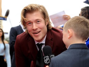 Brock Boeser gets interviewed after arriving on the red carpet prior to the 2018 Honda NHL All-Star Game at Amalie Arena on January 28, 2018 in Tampa, Florida.