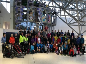 More than 80 runners took part in West Van Run Crew's inaugural New Year Breakfast Run on Saturday morning, but first they stopped inside Park Royal mall for a pre-run group shot.