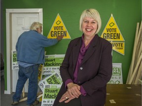 Adriane Carr and husband Paul are shown at Green Party of Vancouver headquarters in 2014, when Carr topped polls among city councillors. She says she is 'ready and willing' to run for mayor this year.