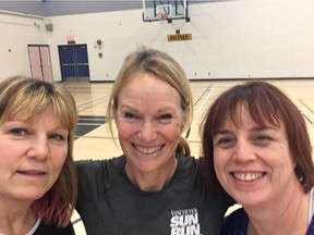 Debbie Elliott, left, and Sandra Jong Sayer, right, take a selfie with former Olympian and BCSportMed run/walk coach Lynn Kanauka in Burnaby earlier this month during a Vancouver Sun Run InTraining workshop for coordinators and leaders.