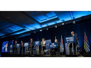 BC Liberal leadership debate candidates on stage at the Westin Bayshore on Tuesday, Jan. 23. Left-right: Todd Stone, Michael Lee, Andrew Wilkinson, Dianne Watts, Sam Sullivan, and Michael de Jong.