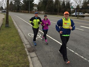 Vern Ehrenholz, a longtime leader with the Vancouver Sun InTraining Clinic, leads a pair of Fraser Valley runners through their paces in the Learn To Run Stronger program.