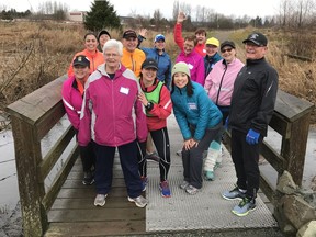 Participants in the Langley Sun Run InTraining Clinic stopped for a quick group shot just before the majestic memorial in Derek Doubleday Arboretum that honours Canadian soldiers lost in Afghanistan. (Gord Kurenoff photo, Postmedia News) [PNG Merlin Archive]