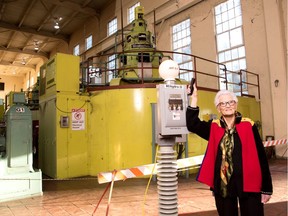 Georgean Price shuts down the first of six turbines to be decommissioned at BC Hydro's decommissioned John Hart generating station outside Campbell River. Price was there when the station opened in 1947.