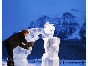 An ice sculptor works on his piece during day one of the 2018 Ice Magic Festival in Lake Louise. [PNG Merlin Archive]