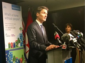 Vancouver Mayor Gregor Robertson and the city's chief financial officer, Patrice Impey, provide a Jan. 29 empty-homes-tax update to the media at city hall.