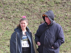 Magee Secondary heptathlete Julie Kawai with her longtime coach David Douglas. Kawai will be competing in the Harry Jerome Indoor Games at the Richmond Olympic Oval.