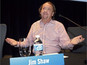Jim Shaw, the former CEO of Shaw Communications, gestures before addressing the company's annual meeting in Calgary, Thursday, Jan. 14, 2010. Shaw died Wednesday following a brief illness.