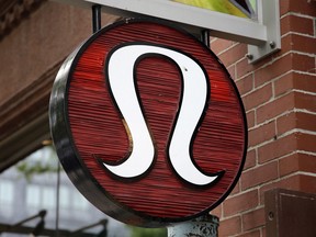 Aa Lululemon Athletica logo outside a store on Newbury Street in Boston.