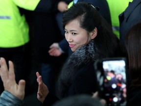 In this Sunday, Jan. 21, 2018, file photo, North Korean Hyon Song Wol, head of North Korea's art troupe, waves as she arrives at the Gangneung Railway Station in Gangneung, South Korea.