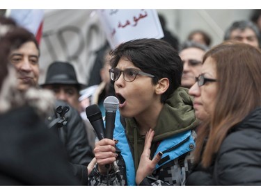 Several different groups crowded the steps of the Vancouver Art Gallery to rally in support of recent unrest in Iran.