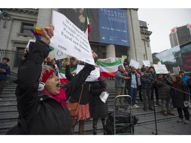 Several different groups crowded the steps of the Vancouver Art Gallery to rally in support of recent unrest in Iran.