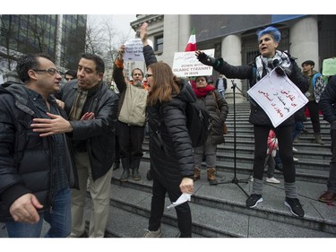 Opposing views about U.S. sanctions caused heated arguments and some pushing at overlapping rallies by Iranian Canadians in Vancouver on Saturday.
