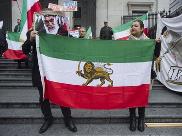 Several different groups crowded the steps of the Vancouver Art Gallery to rally in support of recent unrest in Iran.