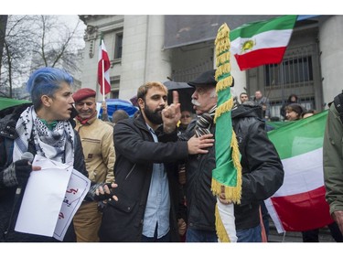 Several different groups crowded the steps of the Vancouver Art Gallery to rally in support of recent unrest in Iran.
