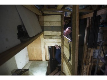 Jay Post works on the home he made from a shipping container.