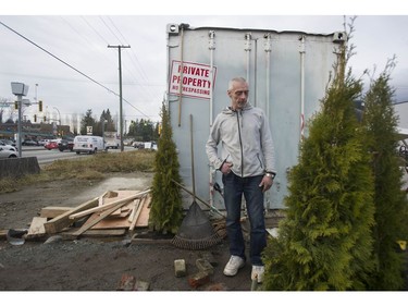 Jay Post in front of the home he made from a shipping container.