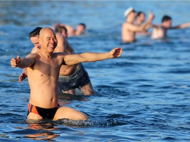 Participants in the 98th annual Polar Bear Swim in action at English Bay in Vancouver, BC., January 1, 2018.