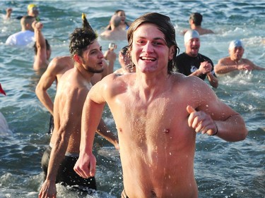 Participants in the 98th annual Polar Bear Swim in action at English Bay in Vancouver, BC., January 1, 2018.