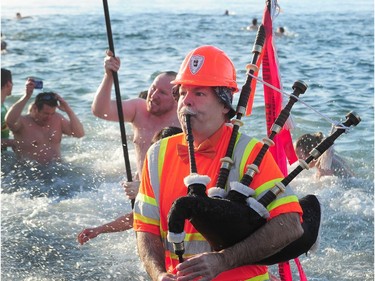 Participants in the 98th annual Polar Bear Swim in action at English Bay in Vancouver, BC., January 1, 2018.