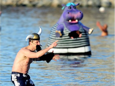 Participants in the 98th annual Polar Bear Swim in action at English Bay in Vancouver, BC., January 1, 2018.