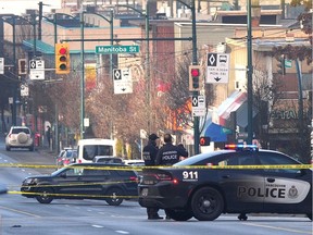 VANCOUVER, BC., January 14, 2018 -- Police on the scene of an overnight shooting on West Broaday Ave and Ontario St in Vancouver, BC., January 14, 2018. Three people were taken to hospital following the shooting at 9:00pm on Saturday evening. (NICK PROCAYLO/PostMedia)  00052010A ORG XMIT: 00052010A [PNG Merlin Archive]