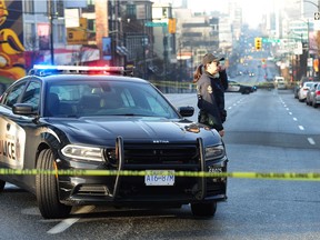 Police on the scene of an shooting at West Broadway and Ontario Street in Vancouver, January 14, 2018.