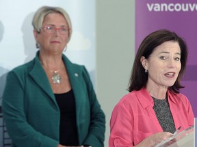 Selina Robinson, right, Minister of Municipal Affairs and Housing; Judy Darcy, Minister of Mental Health and Addictions; and local partners announced new, affordable rental-housing projects for Vancouver's Downtown Eastside, on Jan. 16.