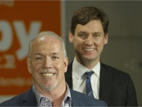 B.C. Premier John Horgan, foreground, and B.C. Attorney General David Eby. Once the New Democrats approve the commissioner and the terms of reference Wednesday, the inquiry should be beyond the reach of their partisan political hands, Vaughn Palmer opines.