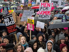 Women's rights demonstrators hold placards and chant slogans during the Time's Up rally at Richmond Terrace, opposite Downing St. on Jan. 21, 2018 in London, England. (Chris J Ratcliffe/Getty Images)