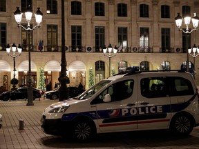 A picture shows a police car parked outside the Ritz luxury hotel in Paris on January 10, 2018, after an armed robbery. (THOMAS SAMSON/AFP/Getty Images)
