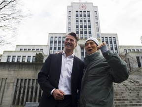 Vancouver Mayor Gregor Robertson stops to chat with a constituent prior to addressing the media after his announcement that he will not run for re-election, January 10 2018.