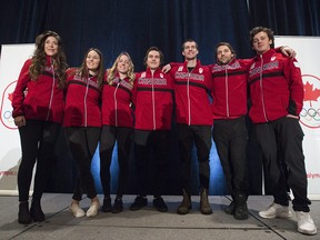 Canada's slopestyle and big air snowboard team poses for a photo after being announced during a news conference in Whistler, B.C., Tuesday, Jan. 9, 2018. The team from right to left are, Mark McMorris of Regina, Sask., Tyler Nicholson of North Bay, Ont., Max Parrot of Bromont, Que., Sebastien Toutant of L'Assomption, Que., Laurie Blouin of Stoneham, Que., Spencer O'Brien of Courtenay, BC., and Brooke Voigt of Fort McMurray, Alta.